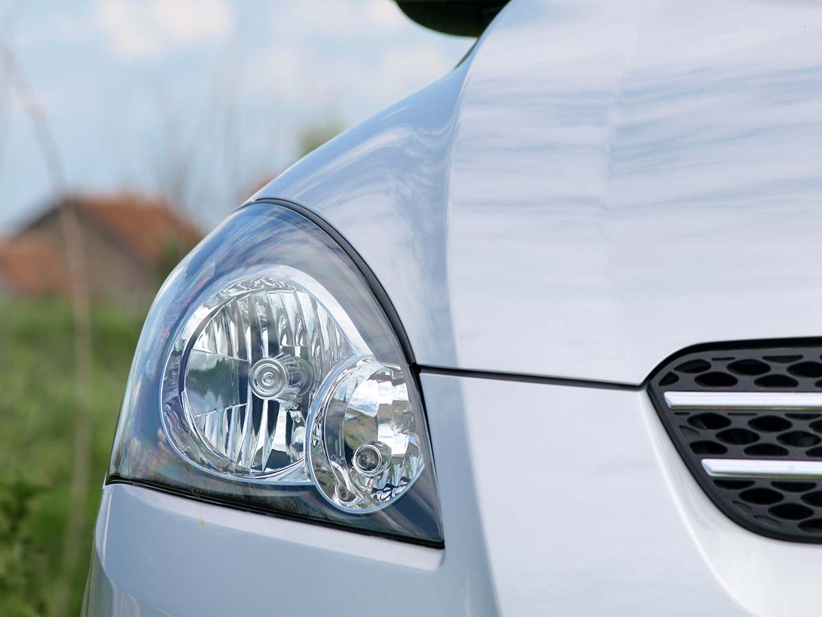 Close up of car headlight at Fast Auto Loans, Inc. location for car title loan in Arizona