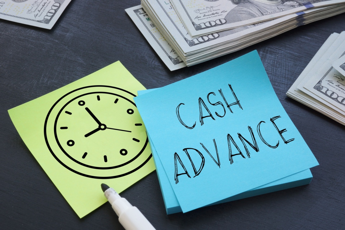 sticky note that says cash advance
