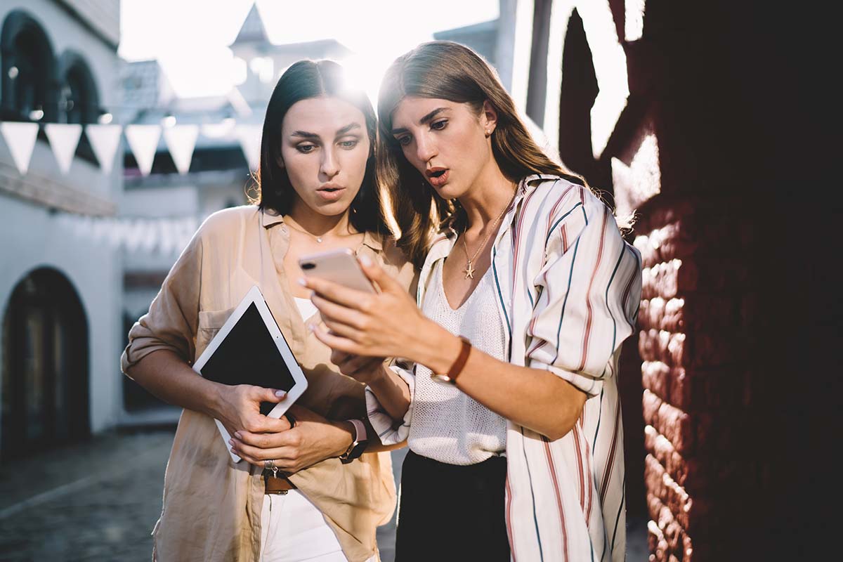 women reading about car title loans in Baton Rouge