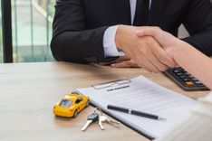 person with representative receiving title loan without a job
