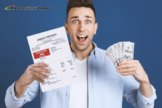 man holds bad credit report and $1,000 from payday loan