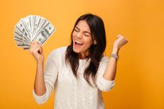 Woman happy and excited from getting car title loan fast cash
