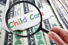 registration loan cash with child care paper sitting on top of it