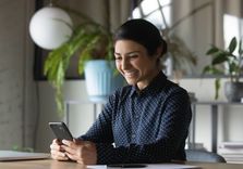 woman very happy from being approved for fast payday loans