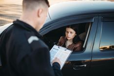woman receive a traffic ticket