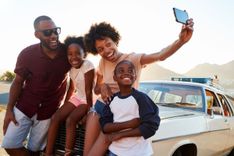 a family enjoys their affordable family vacations