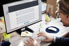 woman applying for title loans online from her office