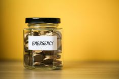 title loan emergency money jar on desk