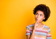 woman thinking about how to get a loan without a bank account