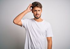 man considering paycheck advance from payday loan with no credit