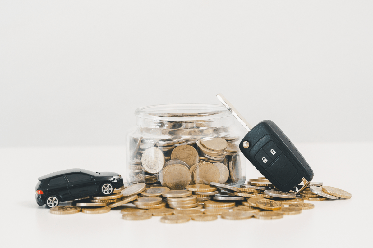 title loan coins with key and toy car