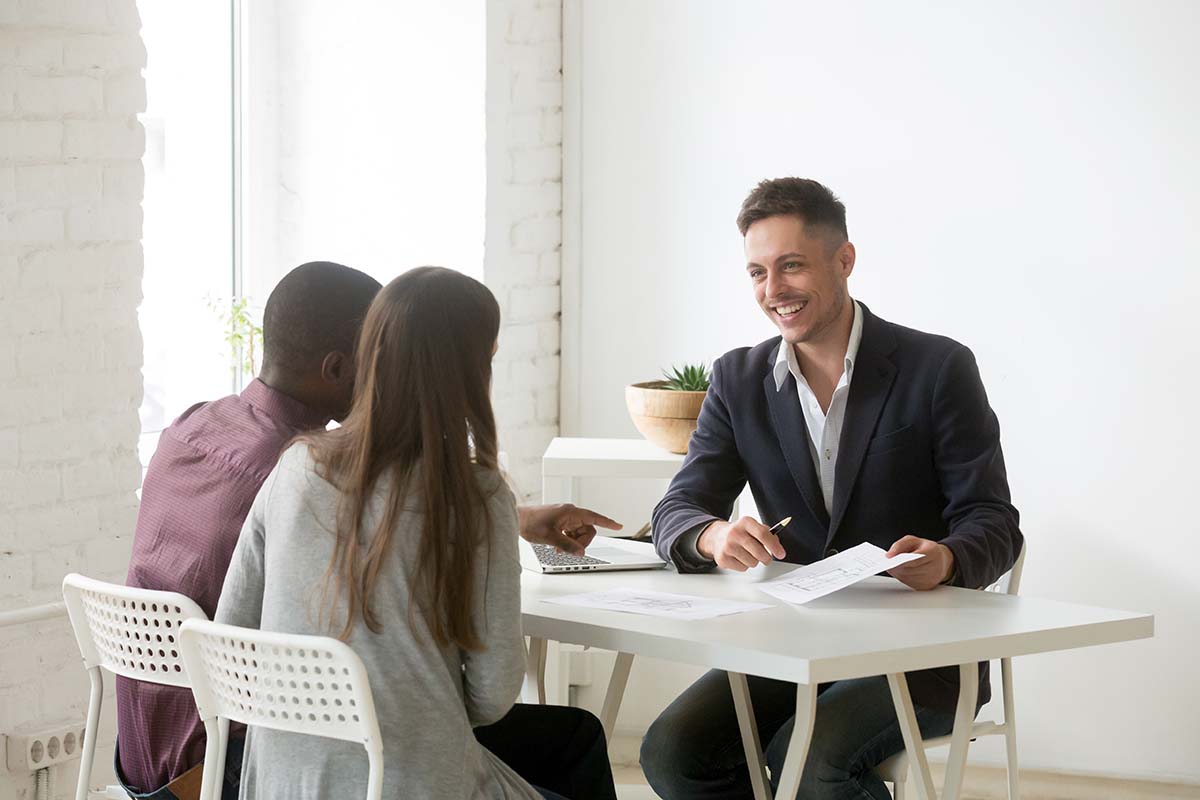 couple getting title loan in meeting