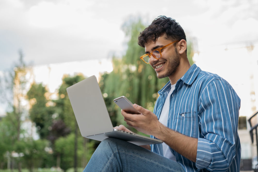 man looking up car title loans