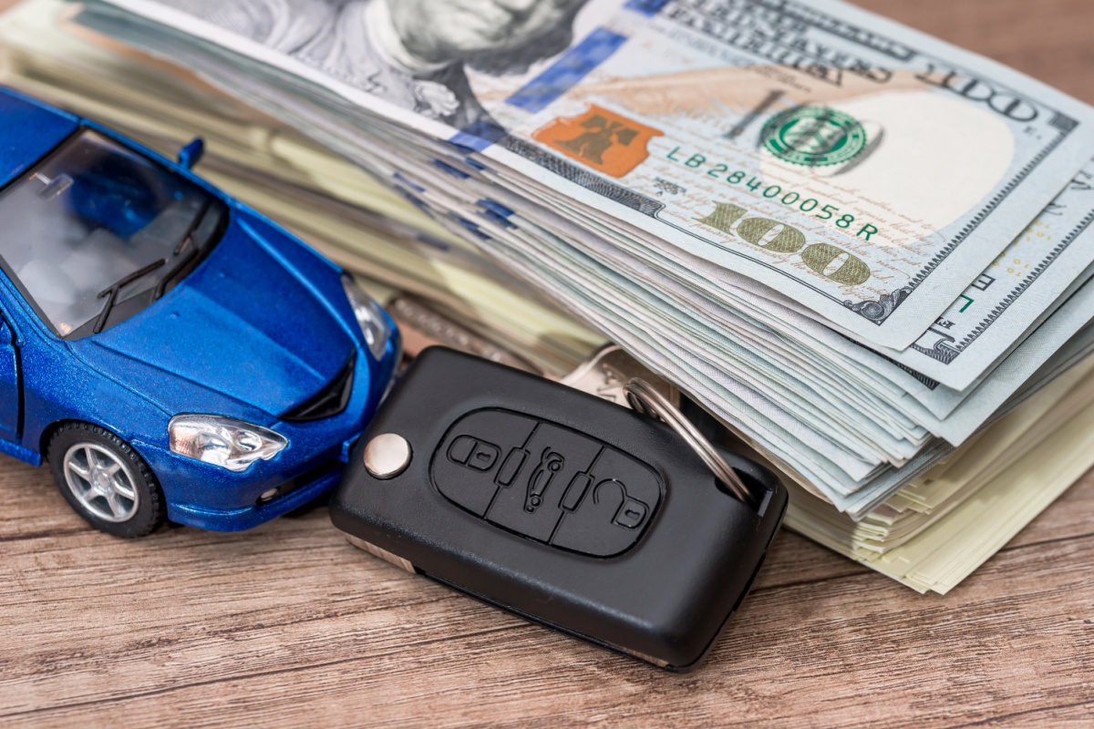 toy car key and cash from title loan in Dover, DE