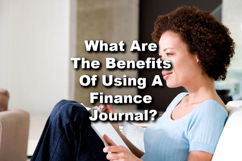 track-expenses-finance-journal-tn woman with journal