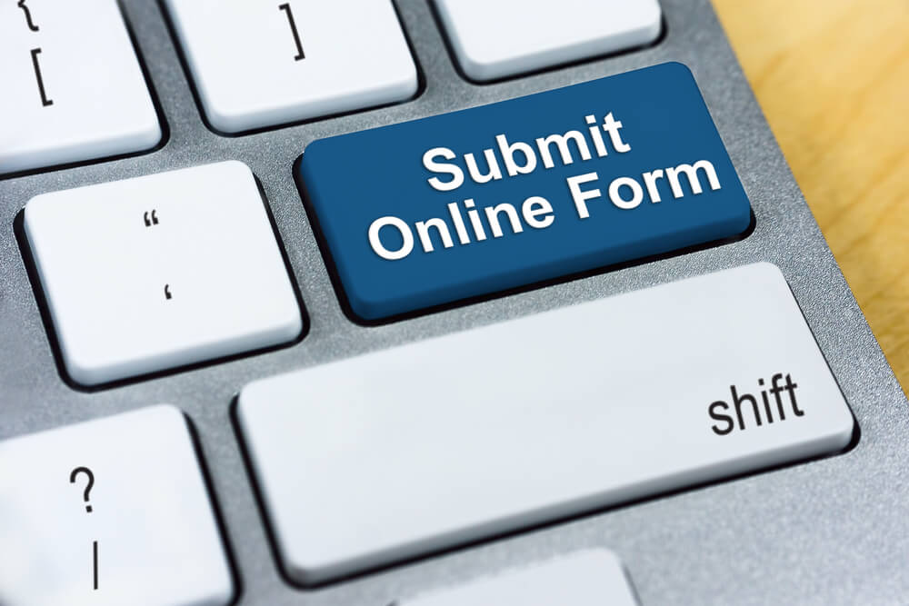 keyboard with key for submitting online form for personal loan preapproval