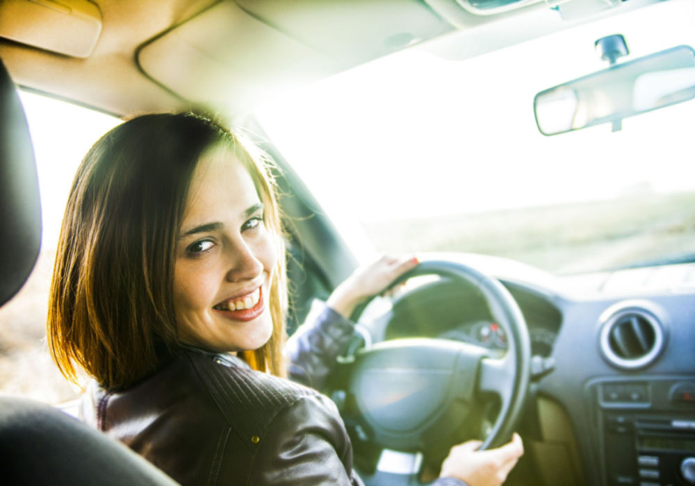 woman in car used for title loans