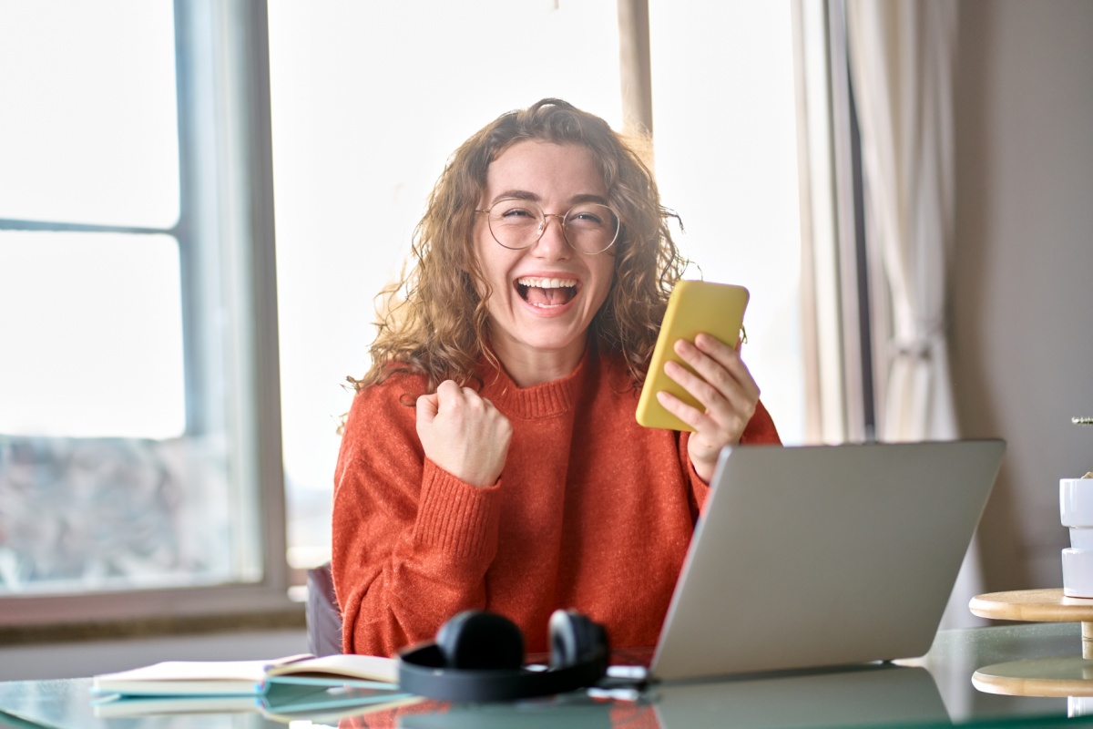 woman happy after getting online installment loan