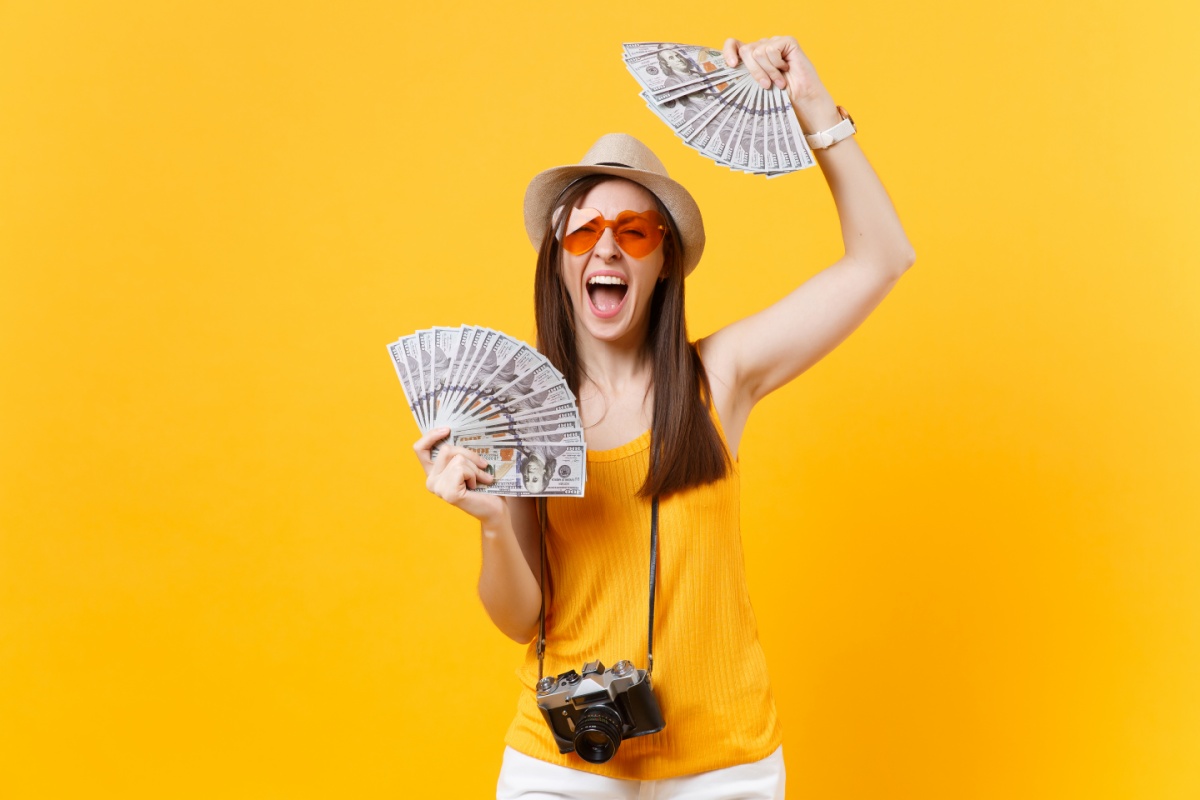 woman holding title loan cash for summer electric cost NV