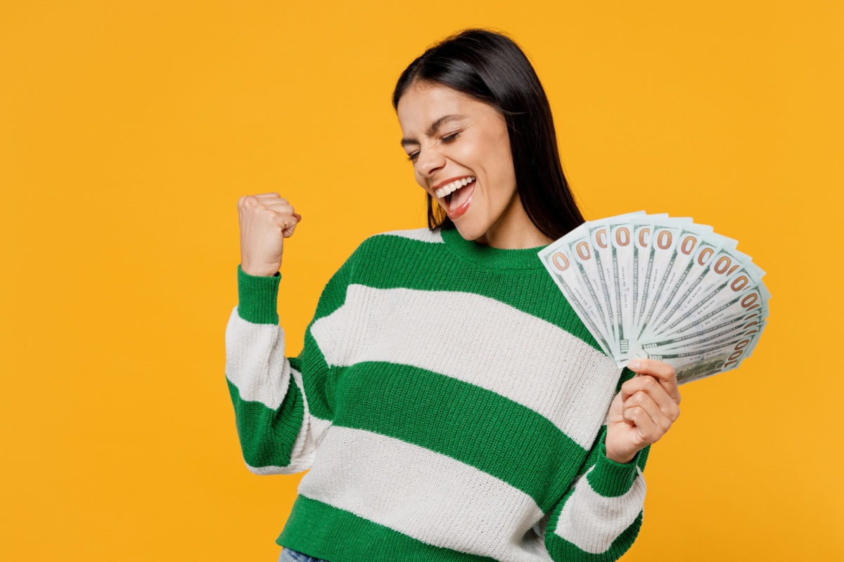 woman holds $4,000 from a title pawn in Georgia