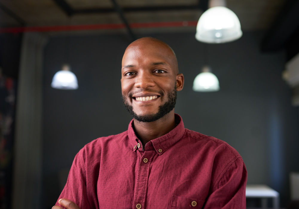 man smiling from getting Carolina Title Loan